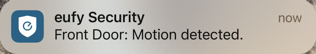 A eufy Security push notification reading Front Door: Motion detected.